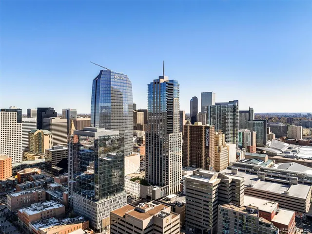 a view of city with tall buildings