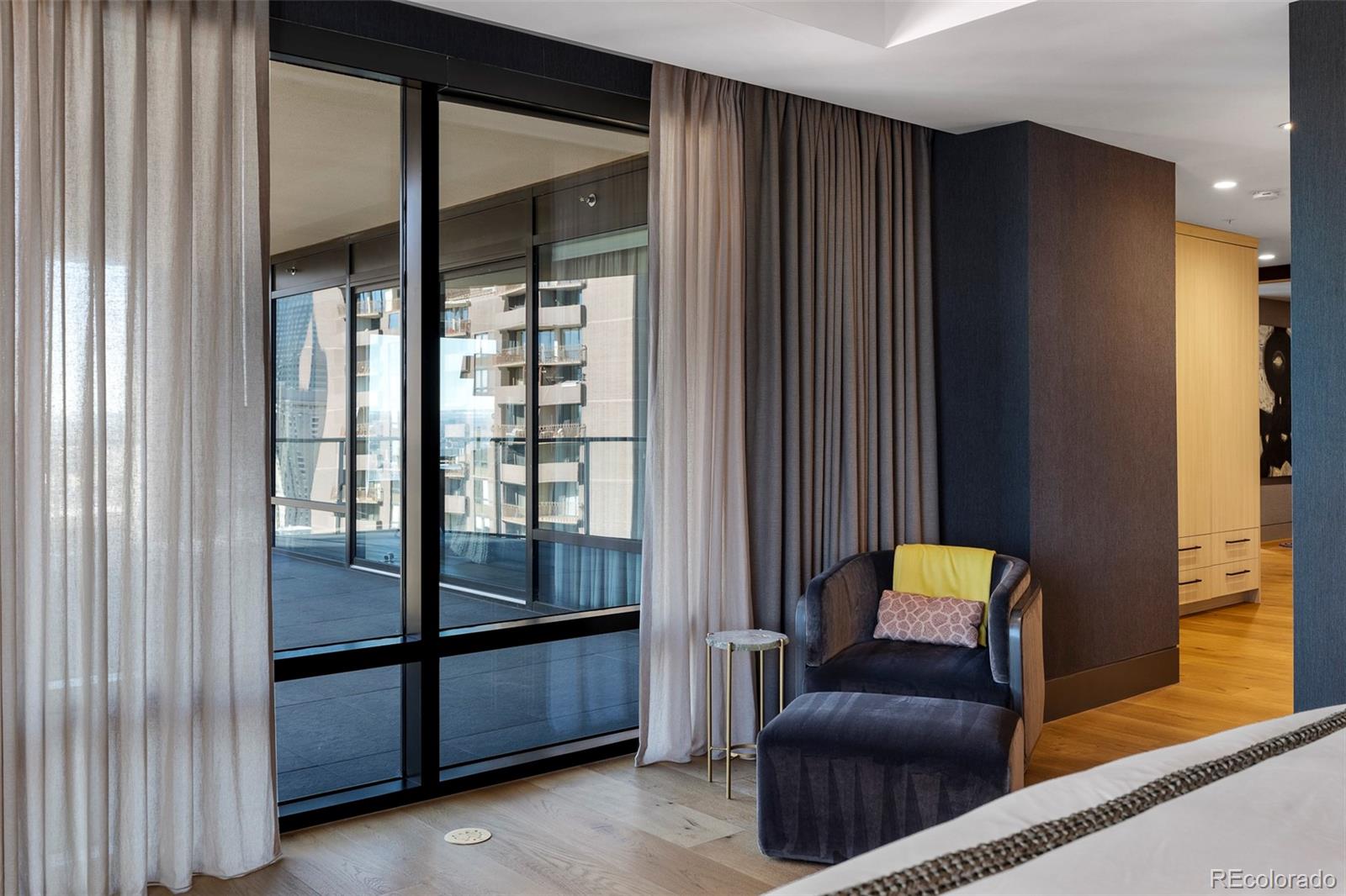 1133 14th Street, Unit 2820 Denver, CO 80202 - Photo 13 of 34 a living room with furniture and a window