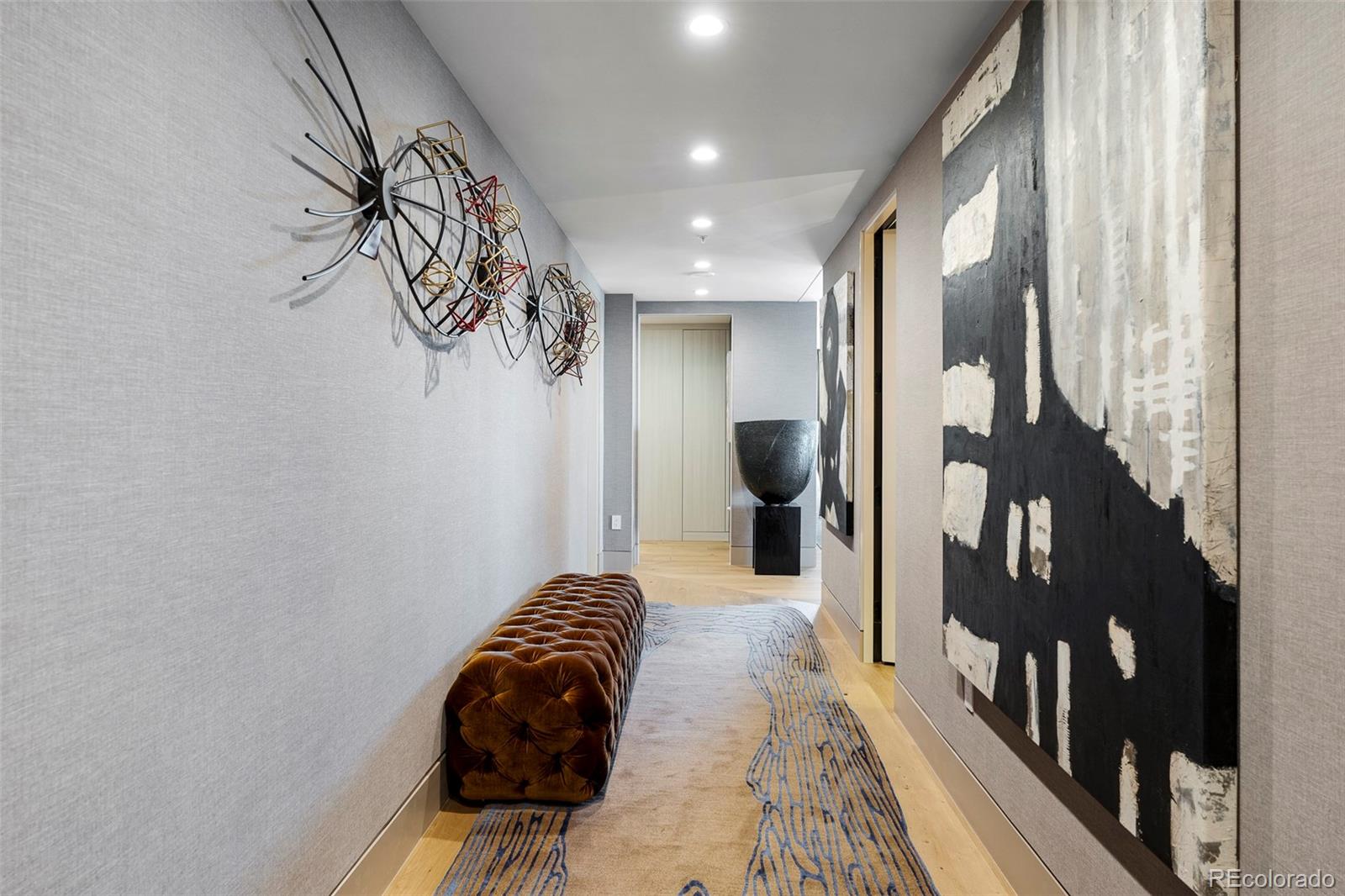 1133 14th Street, Unit 2820 Denver, CO 80202 - Photo 2 of 34 a view of a hallway with a couch