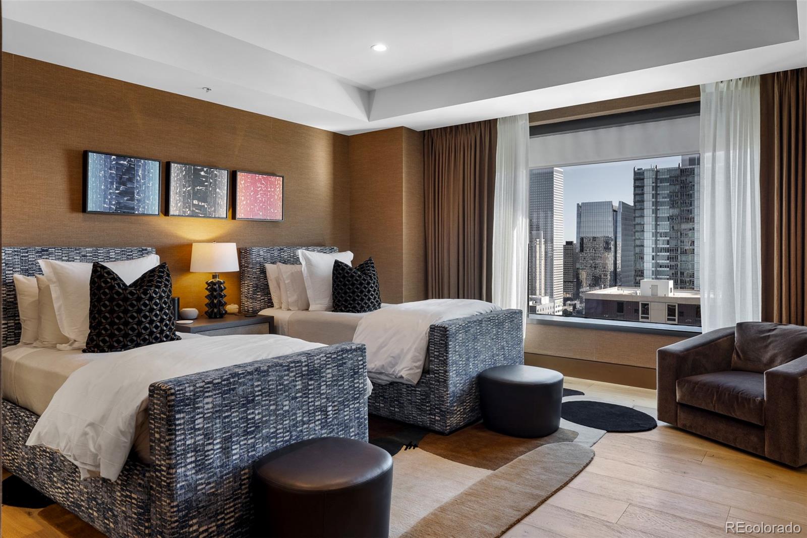 1133 14th Street, Unit 2820 Denver, CO 80202 - Photo 23 of 34 a bedroom with bed couch and window