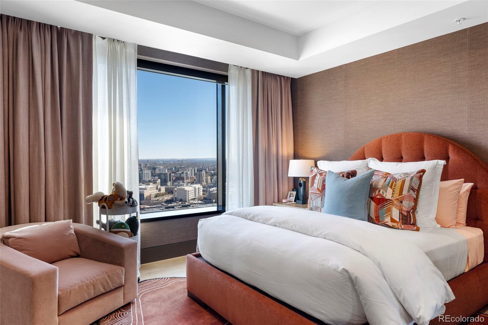 1133 14th Street, Unit 2820 Denver, CO 80202 - Photo 26 of 34 a bedroom with bed couch and window