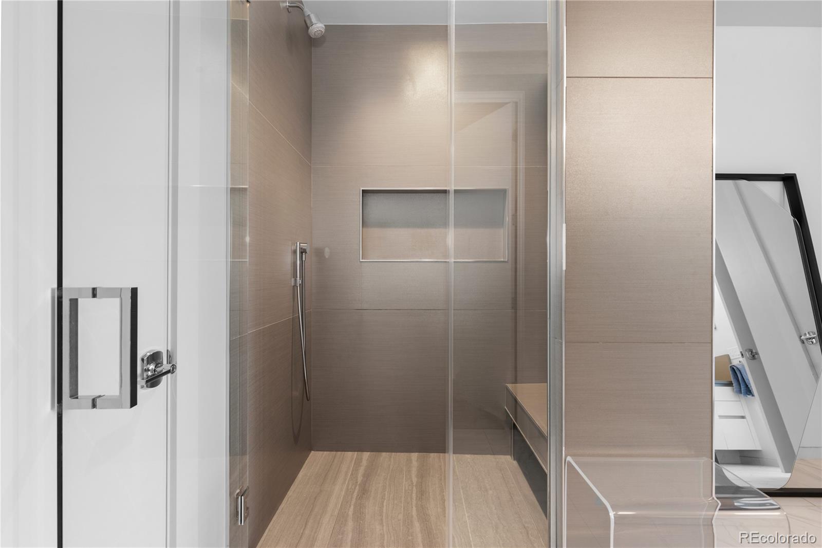 4200 West 17th Avenue, Unit 618 Denver, CO 80204 - Photo 16 of 38 a bathroom with a shower and a sink