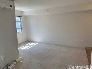 a view of a room with a hallway