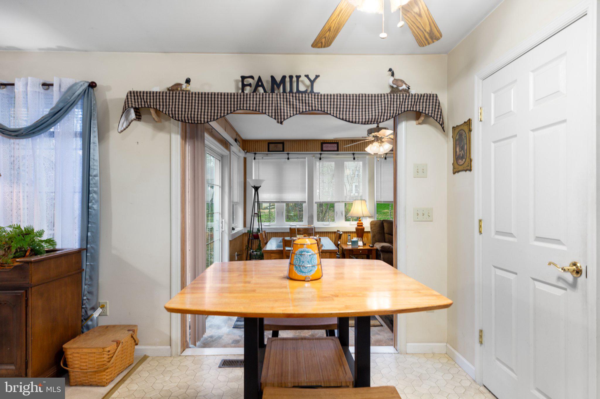 224 Battlefield Road Locust Grove, VA 22508 - Photo 13 of 34 Table space/entrance to 4 season room