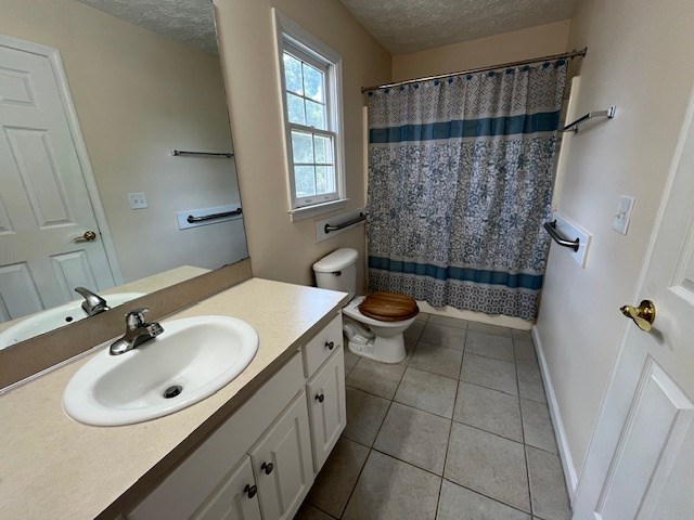 2812 8th Street Columbus, GA 31906 - Photo 11 of 14 a bathroom with a sink toilet a mirror and shower