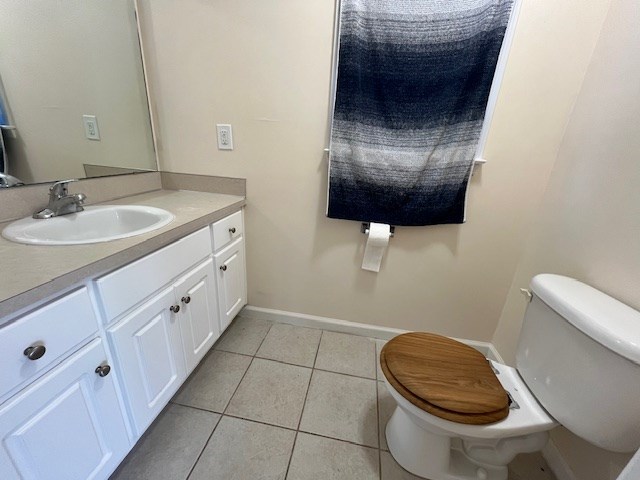 2812 8th Street Columbus, GA 31906 - Photo 13 of 14 a bathroom with a sink a toilet and a mirror