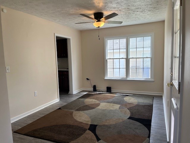 2812 8th Street Columbus, GA 31906 - Photo 6 of 14 a room with chandelier fan and windows