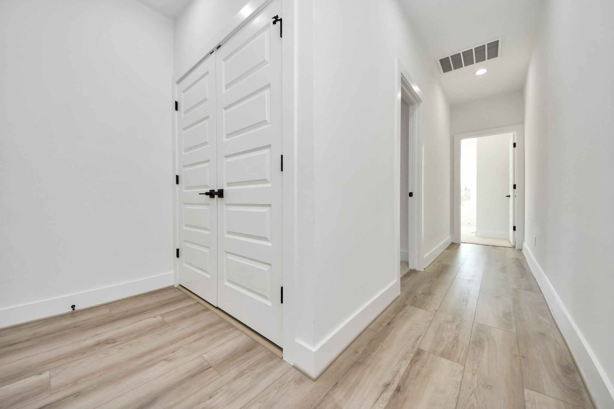 7012 St Augustine Street Houston, TX 77021 - Photo 17 of 45 a view of a room with wooden floor