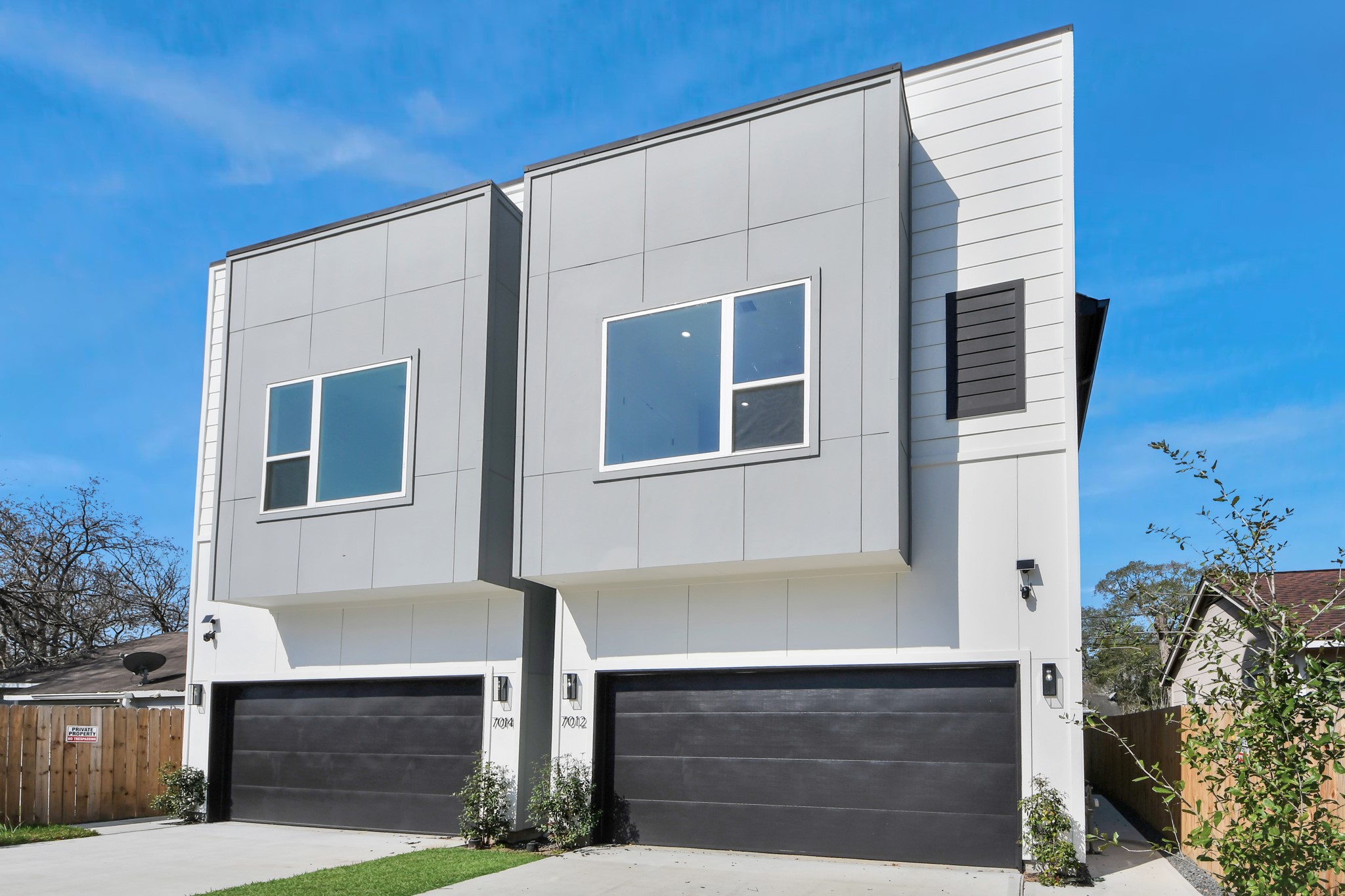 7012 St Augustine Street Houston, TX 77021 - Photo 2 of 45 a front view of a house with garage