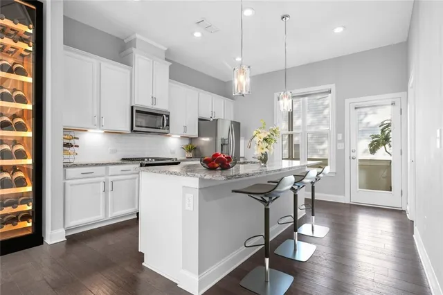 a bathroom with a sink double vanity and a shower