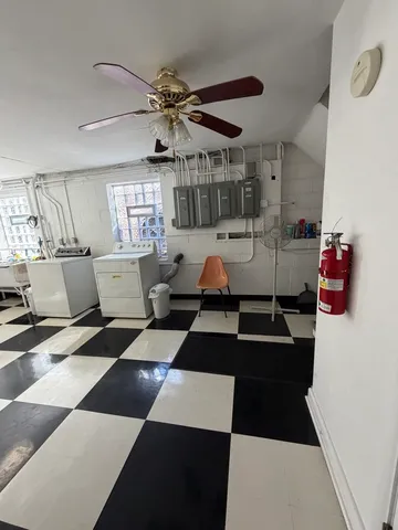 a room with furniture and window