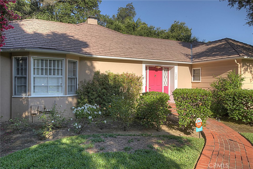 1300 Ramona Road Arcadia, CA 91006 - Photo 1 of 38 a front view of a house with garden