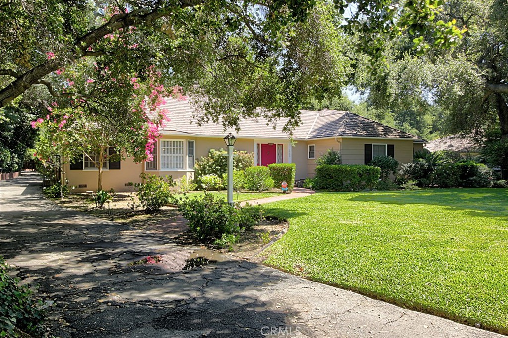 1300 Ramona Road Arcadia, CA 91006 - Photo 11 of 38 a front view of a house with garden