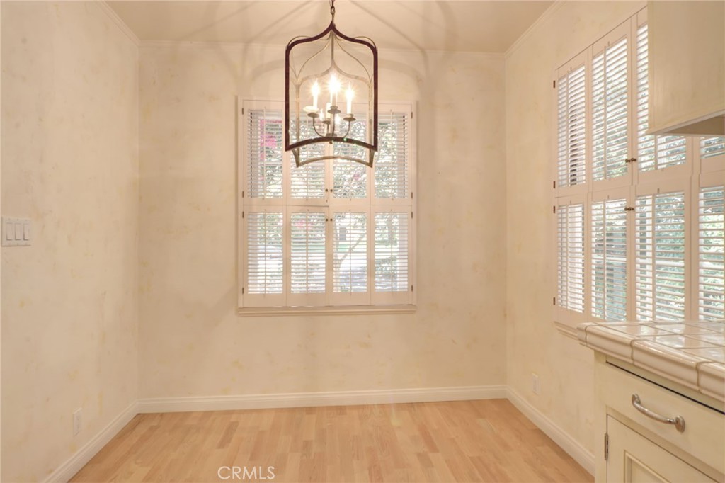 1300 Ramona Road Arcadia, CA 91006 - Photo 19 of 38 an empty room with wooden floor and windows