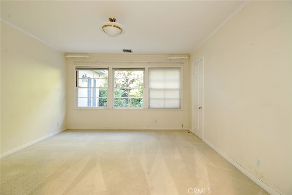 1300 Ramona Road Arcadia, CA 91006 - Photo 20 of 38 an empty room with windows