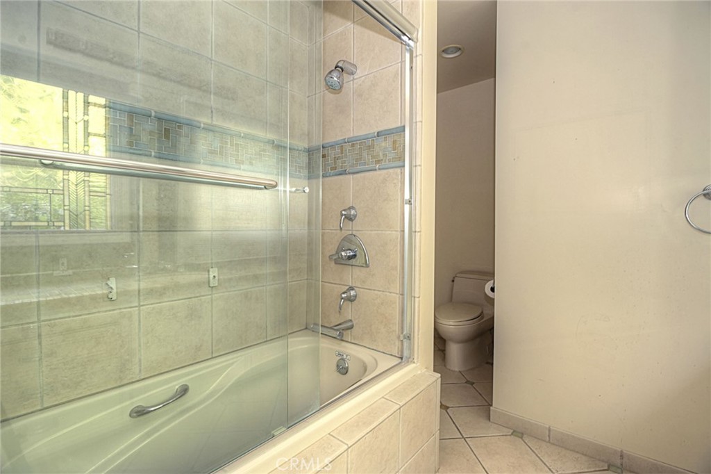 1300 Ramona Road Arcadia, CA 91006 - Photo 34 of 38 a bathroom with a tub shower and sink