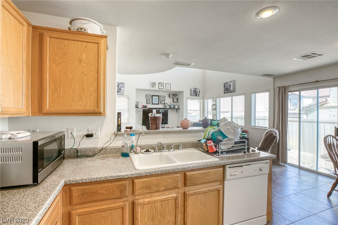 9069 Spoonbill Ridge Place Las Vegas, NV 89143 - Photo 9 of 27