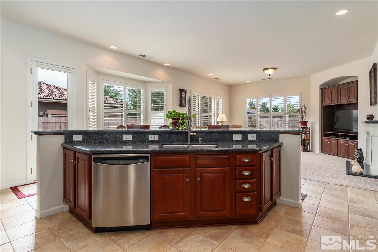 2645 Trail Rider Drive Reno, NV 89521 - Photo 21 of 25 a kitchen with a sink and cabinets