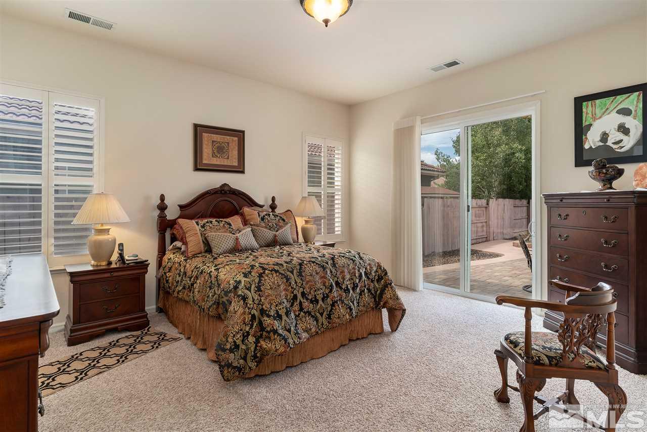 2645 Trail Rider Drive Reno, NV 89521 - Photo 24 of 25 a bedroom with a bed and furniture