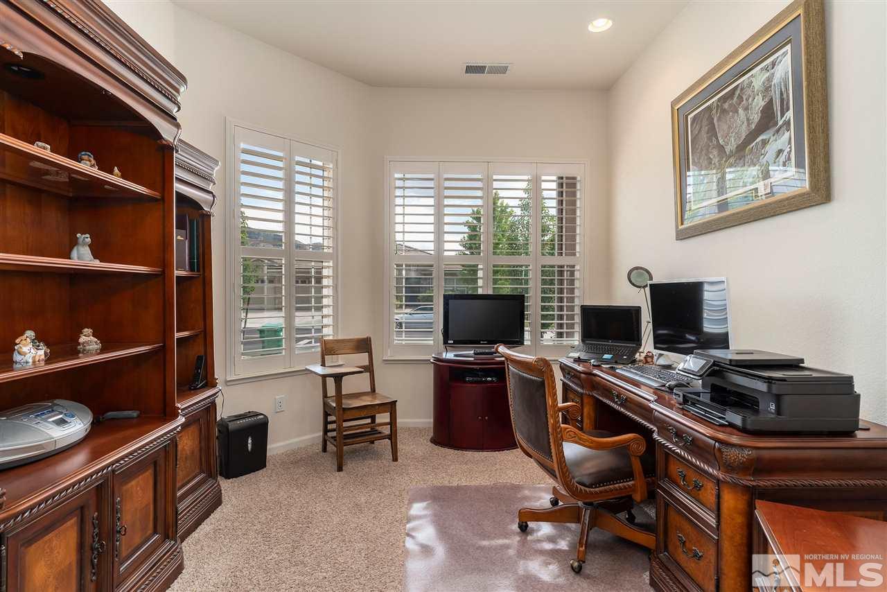 2645 Trail Rider Drive Reno, NV 89521 - Photo 25 of 25 a view of a workspace with furniture and a window
