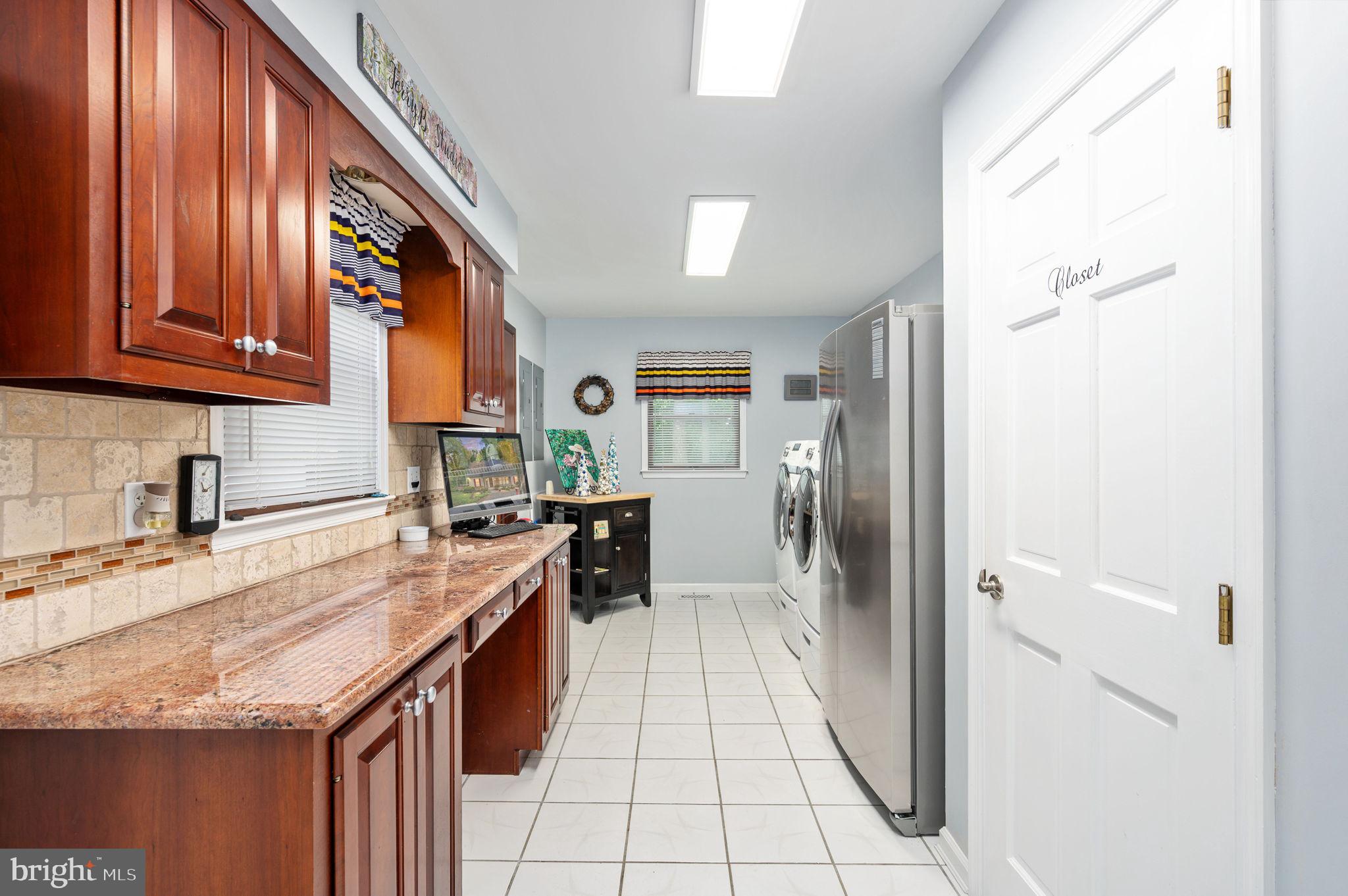 11105 Waddell Road Bumpass, VA 23024 - Photo 28 of 76 Outstanding Laundry Room w/Granite Counters