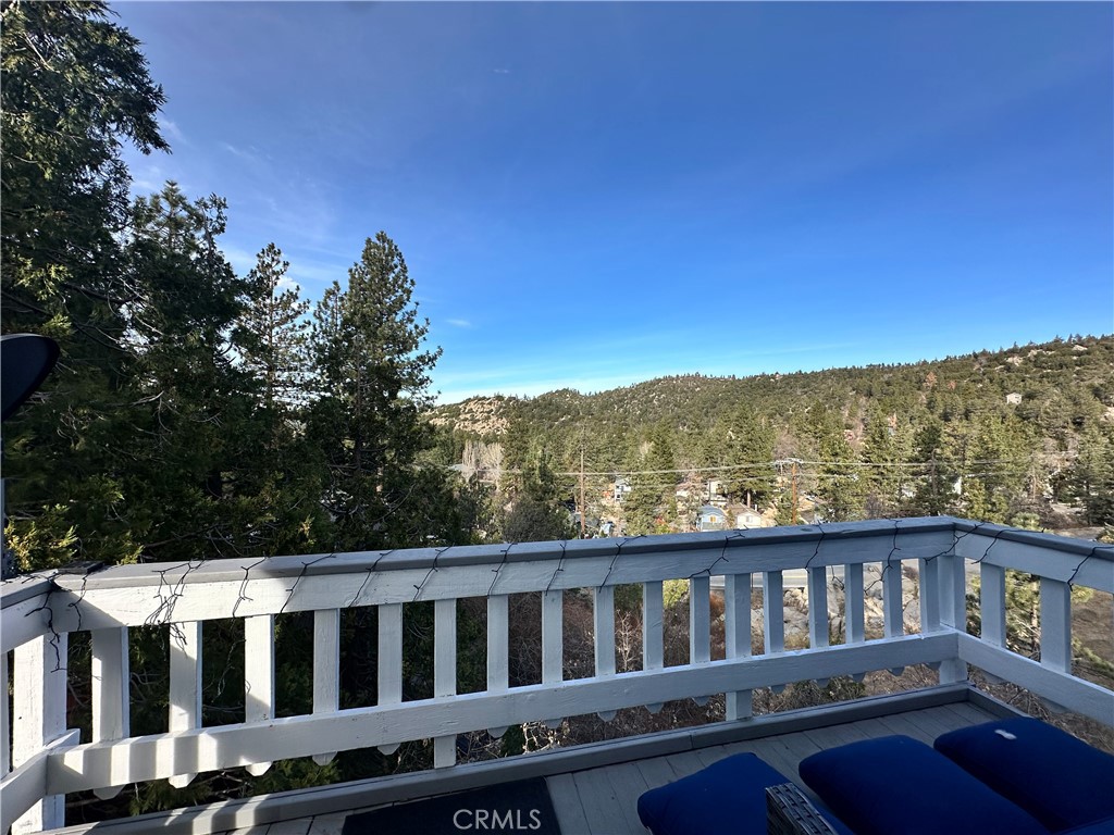 33010 Donner Lane Running Springs, CA 92382 - Photo 16 of 29 a view of a city street from a balcony
