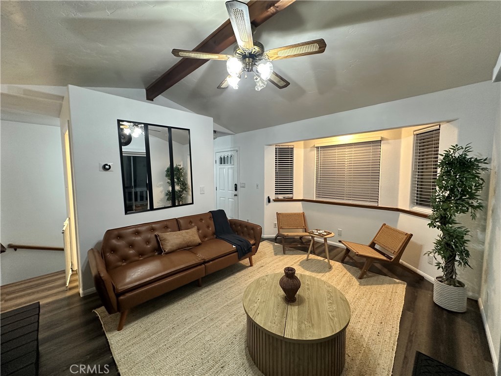33010 Donner Lane Running Springs, CA 92382 - Photo 26 of 29 a living room with furniture and a large window