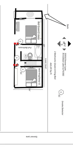 a picture of a bathroom with a shower and a mirror