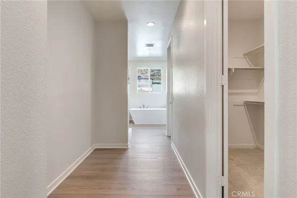 a view of an empty walk in closet