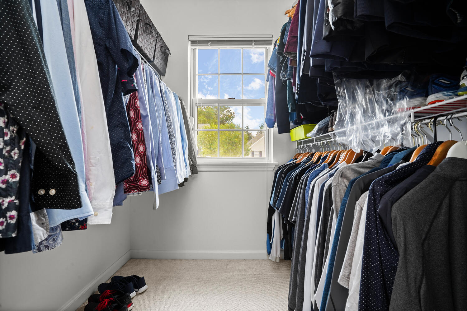 1 Shore Road, Unit 9 Stamford, CT 06902 - Photo 18 of 27 a view of walk in closet with clothes and shoes