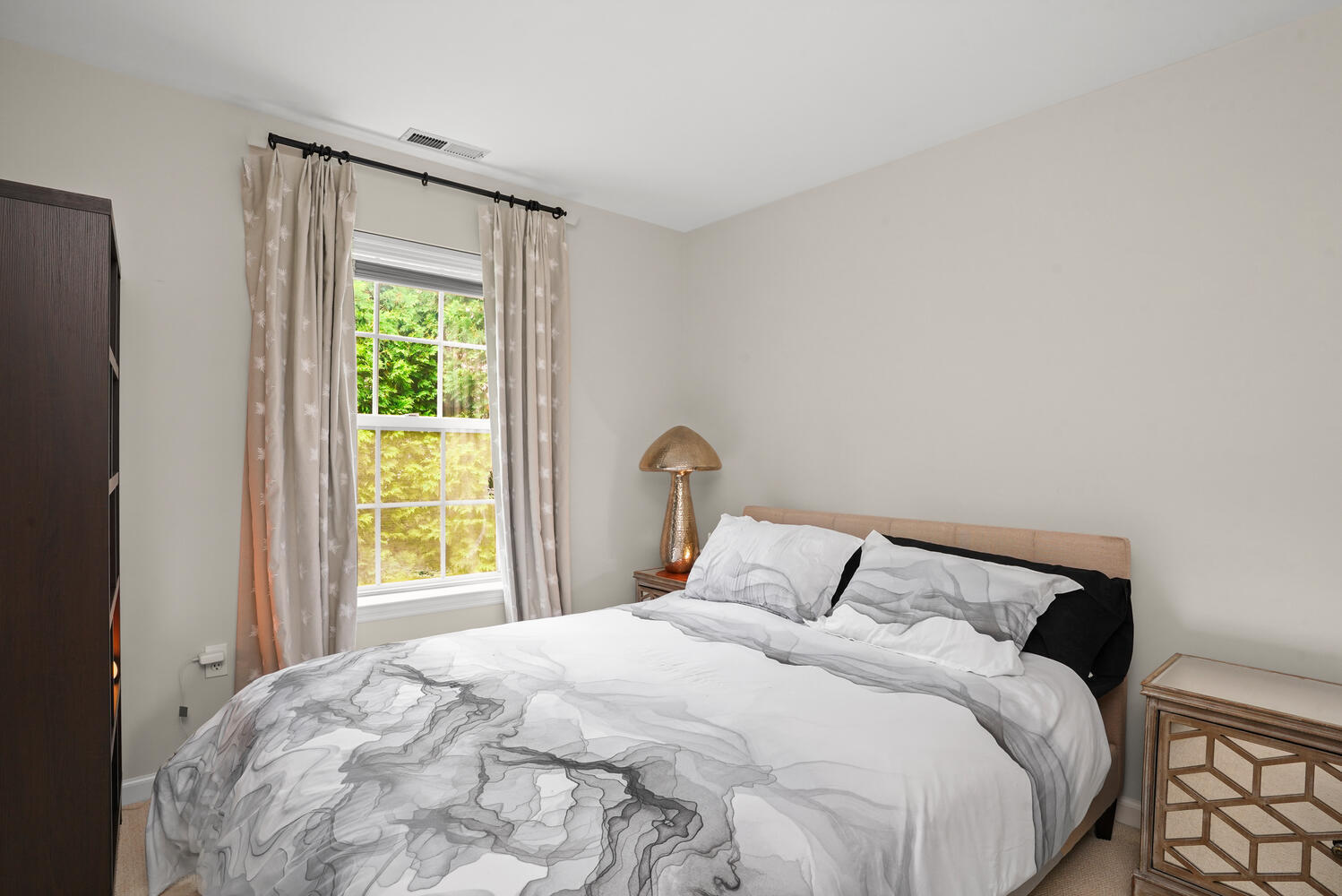 1 Shore Road, Unit 9 Stamford, CT 06902 - Photo 19 of 27 a bedroom with a bed and a window