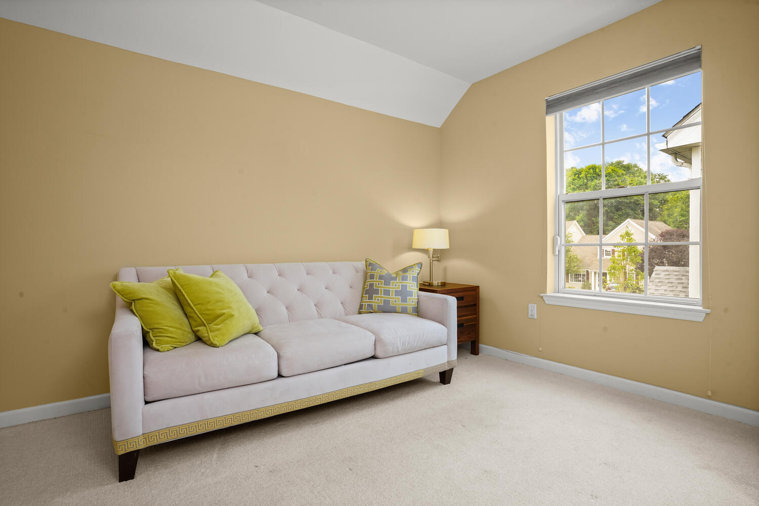 1 Shore Road, Unit 9 Stamford, CT 06902 - Photo 20 of 27 a living room with a couch and a table