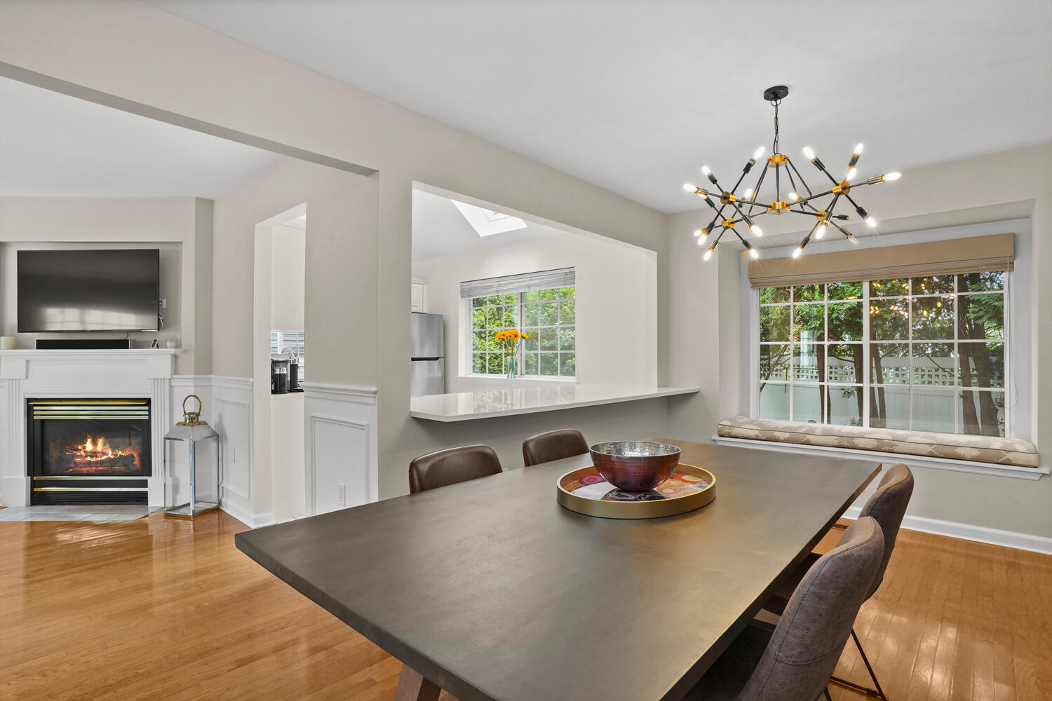 1 Shore Road, Unit 9 Stamford, CT 06902 - Photo 10 of 27 a view of a dining room with furniture window and wooden floor