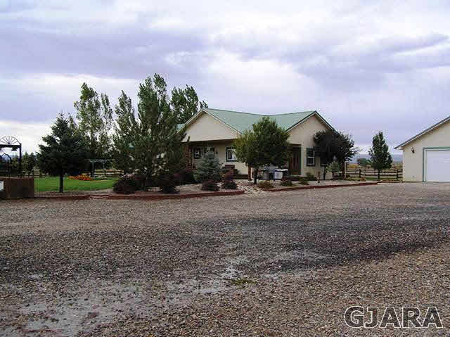 675 S Road Mack, CO 81525 - Photo 11 of 27 a view of a town with large trees