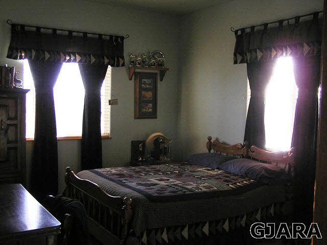675 S Road Mack, CO 81525 - Photo 6 of 27 a view of a hallway with furniture