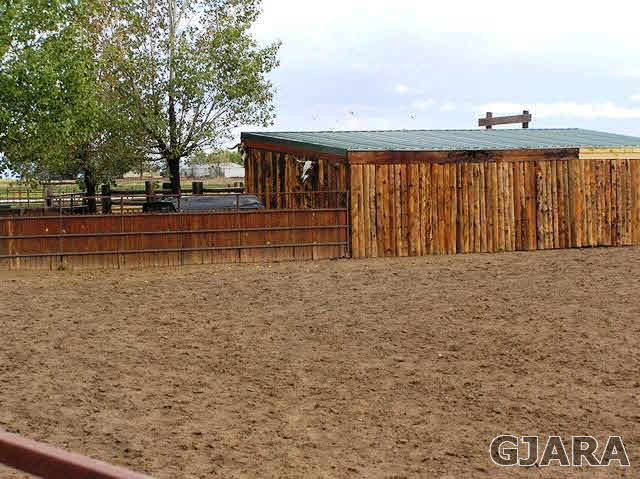 675 S Road Mack, CO 81525 - Photo 7 of 27 a view of swimming pool with outdoor seating and deck