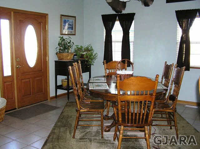 675 S Road Mack, CO 81525 - Photo 10 of 27 a view of a dining room with furniture and window