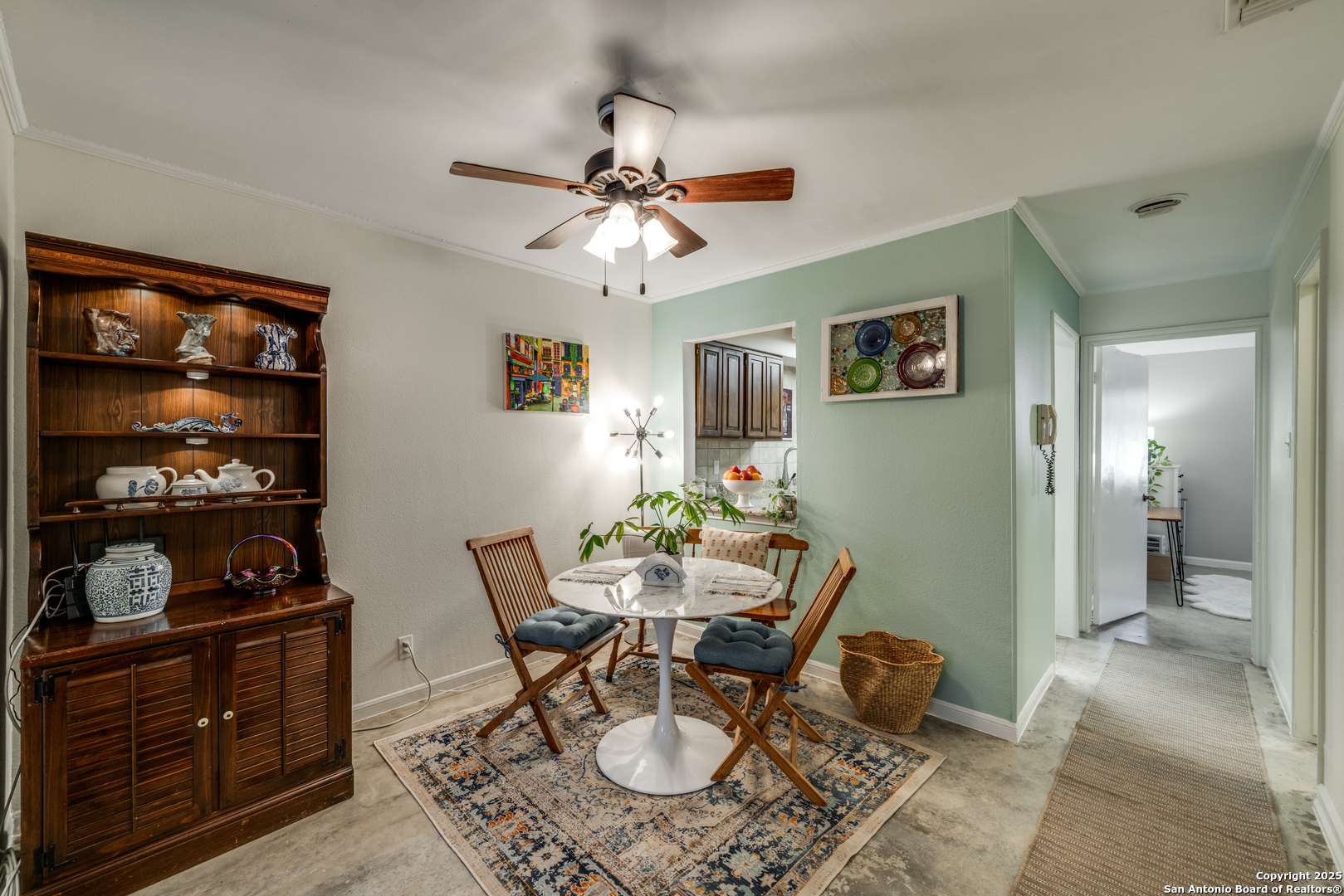 7738 Chambers Road, Unit 903 San Antonio, TX 78229 - Photo 3 of 22 a view of a dining room with furniture