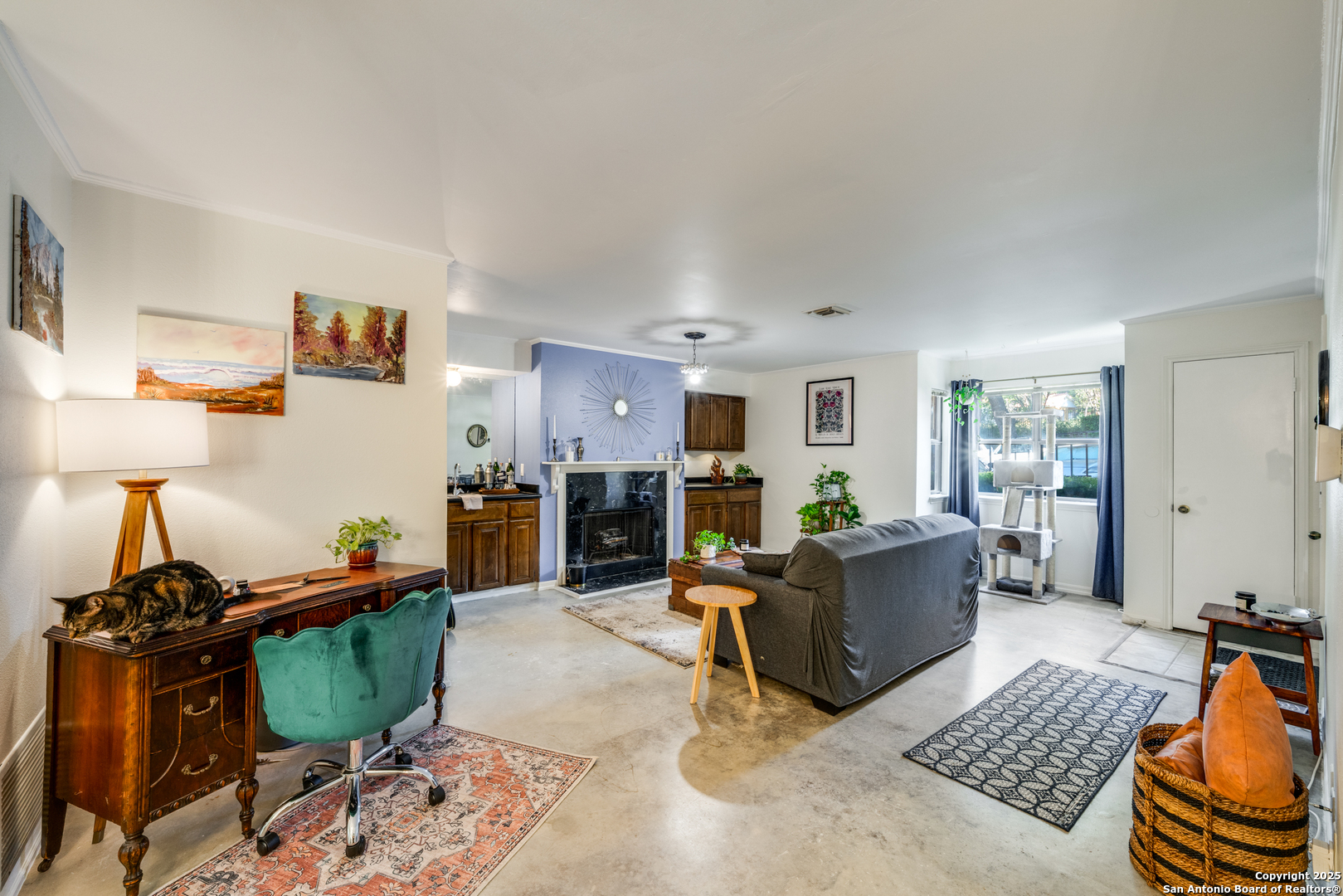 7738 Chambers Road, Unit 903 San Antonio, TX 78229 - Photo 6 of 22 a living room with furniture and a window