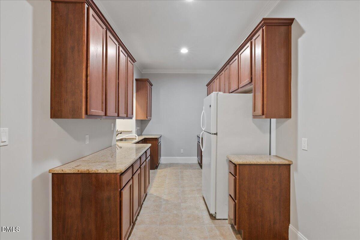 7324 Sparhawk Road Wake Forest, NC 27587 - Photo 70 of 74 Full kitchen in basement