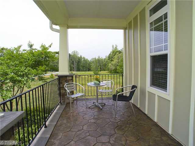 6806 Trevor Road Browns Summit, NC 27214 - Photo 2 of 16 Patio/Deck. Front porch