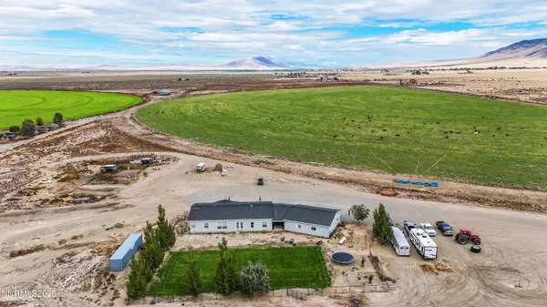 an aerial view of a house with a garden