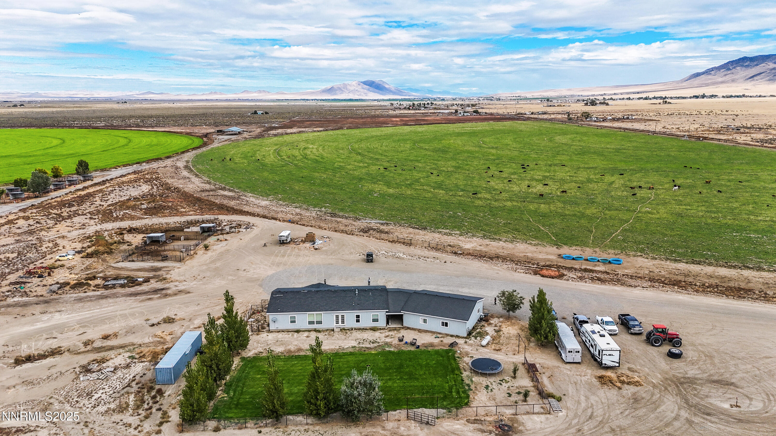 an aerial view of a house with a garden