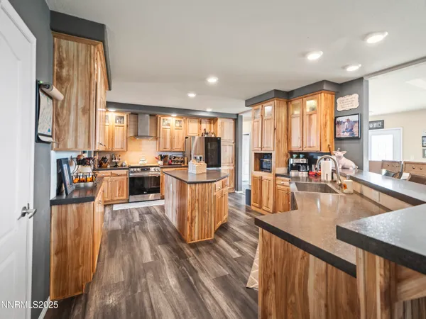 a kitchen with stainless steel appliances lots of counter top space