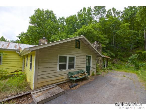 1401 Laughter Road Mill Spring, NC 28756 - Photo 1 of 2 a view of a backyard