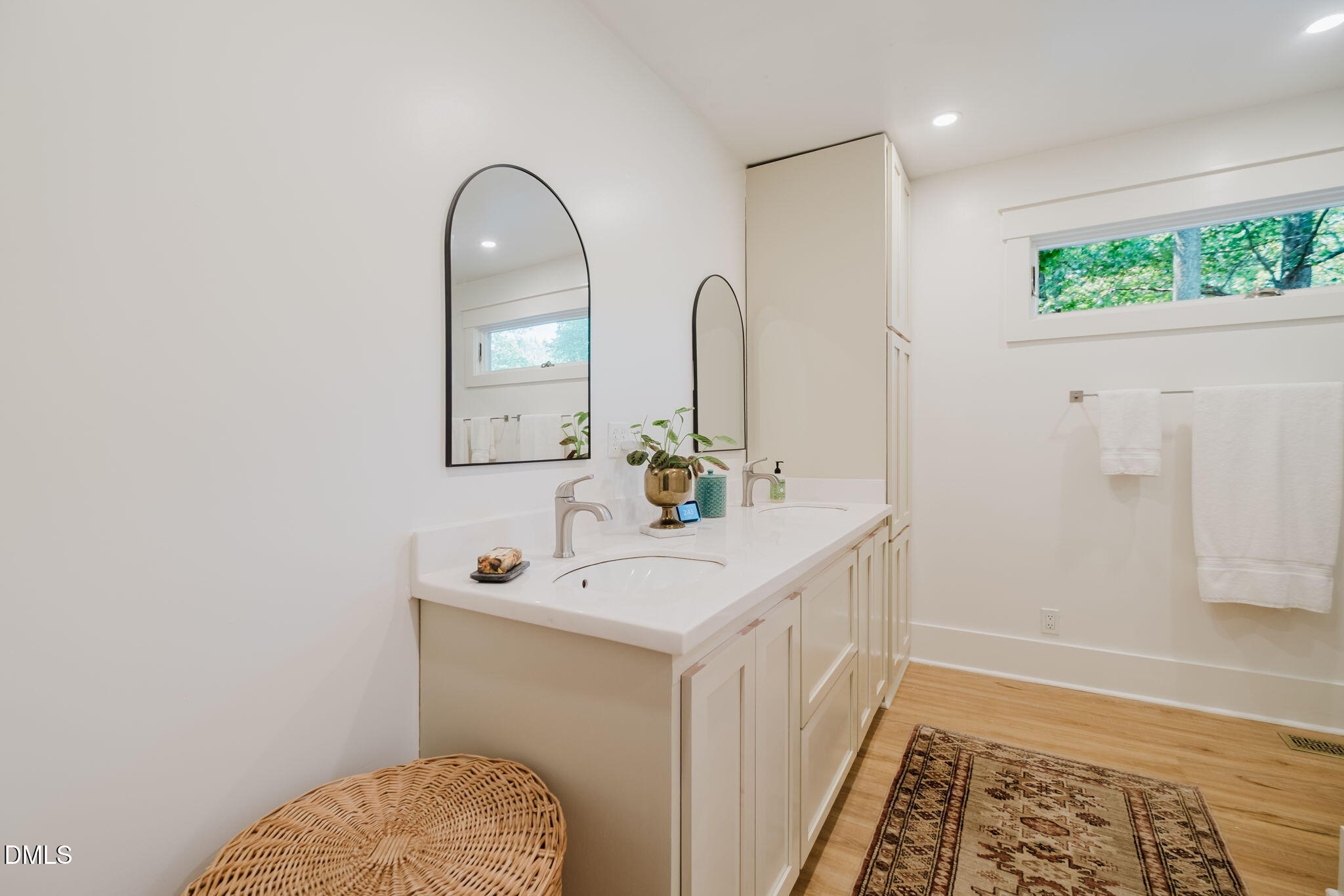 370 Robinson Ferry Road Macon, NC 27551 - Photo 40 of 85 a bathroom with a sink and a mirror