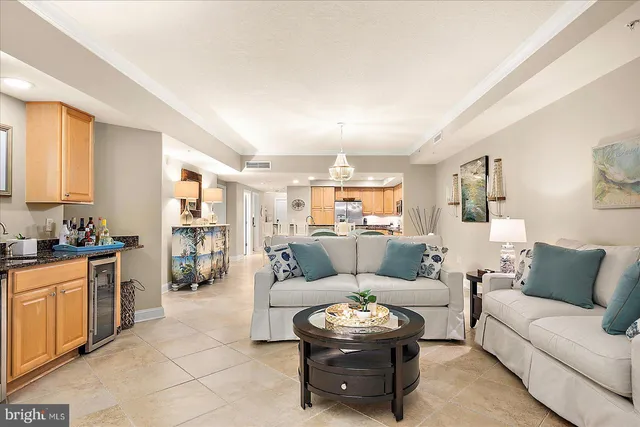 a kitchen with stainless steel appliances granite countertop a stove a refrigerator and a sink