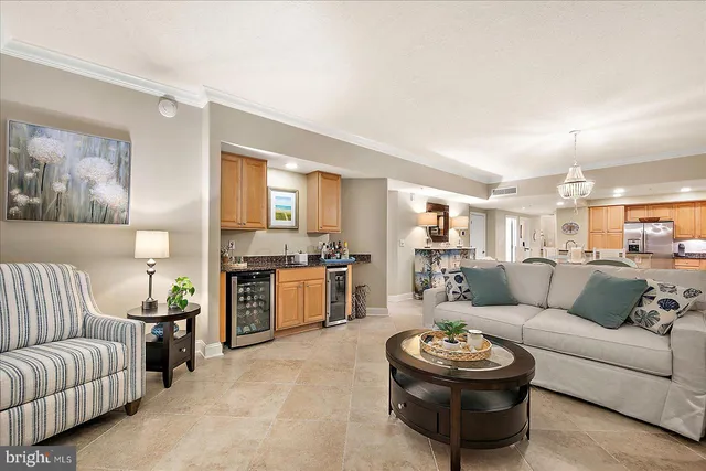 a kitchen with stainless steel appliances granite countertop a stove sink and microwave