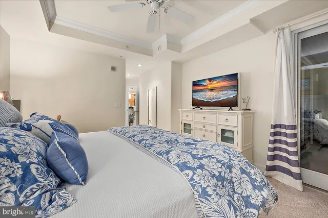 a spacious bathroom with a tub sink and mirror