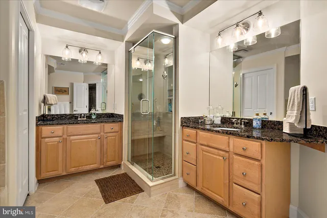 a bedroom with a bed and a mirror